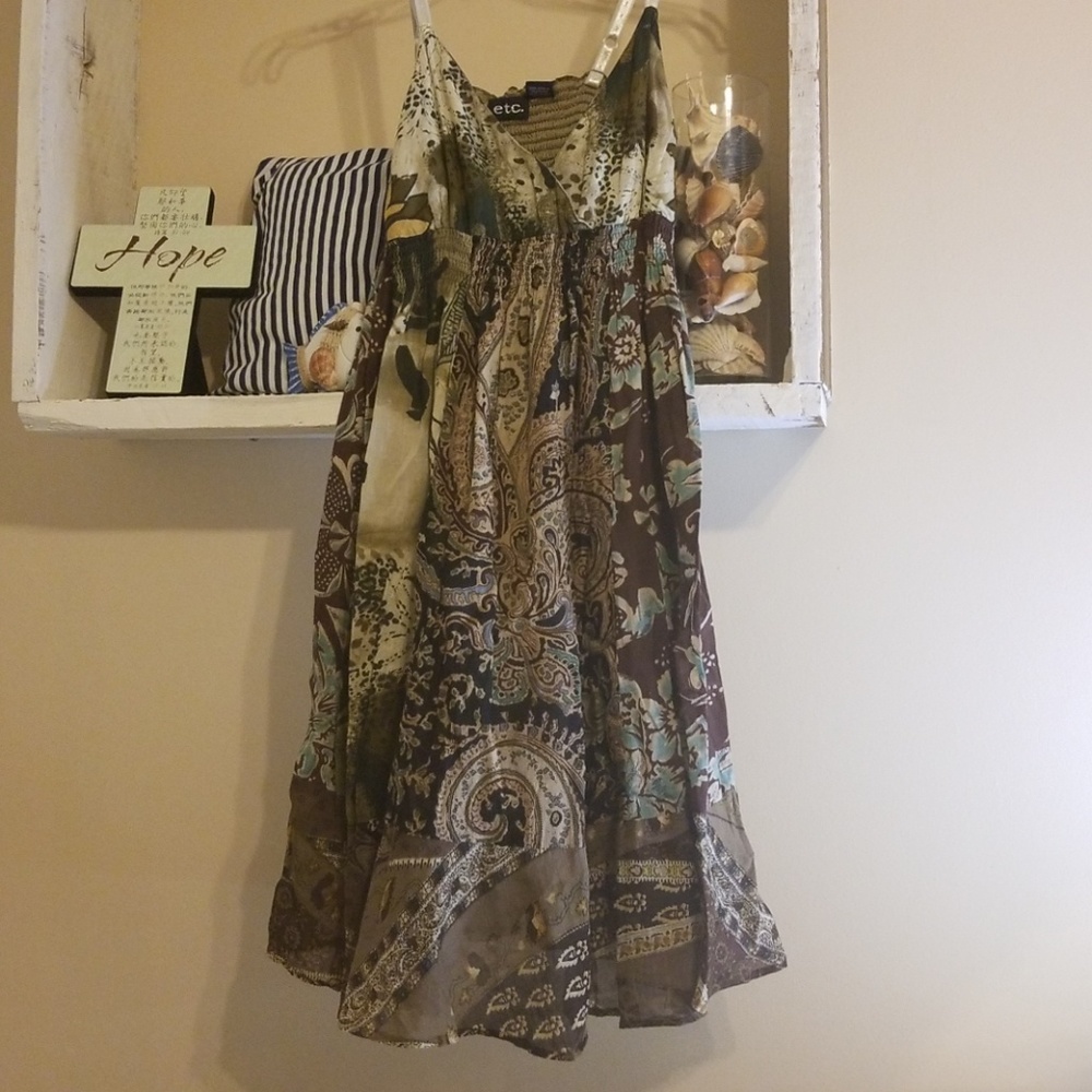 Cute adjustable spaghetti strap dress.